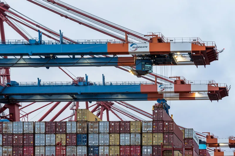 Port cranes over stacked containers